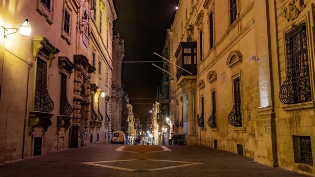 Time lapse view of Merchant street in Valletta, Malta, at night