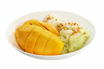 Sweet sticky rice with mango isolated on white background. Stacked image with clipping path for advertising, Mango is popular tropical fruit for dessert in Asia served with sticky rice, coconut milk.