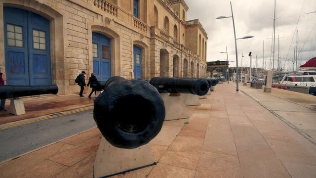 The waterfront in Birgu (Vittoriosa) with cannons (Malta)