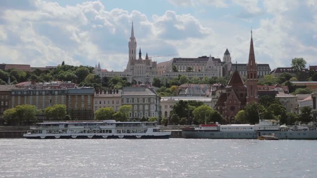 Standing footage from the side of buda and region of Matthias Church with less water traffic in Budapest.
