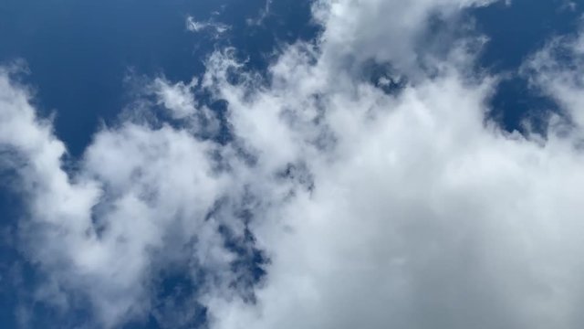 Timelapse of thick rain clouds pulling in the sky