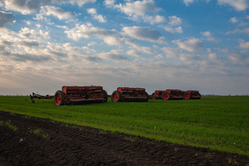 Obraz premium agricultural planter in the field