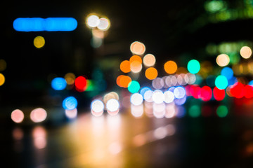 Abstract blurred background of night city.Night traffic,colorful lights