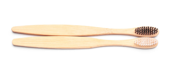 Wooden brushes on white background. Zero waste concept