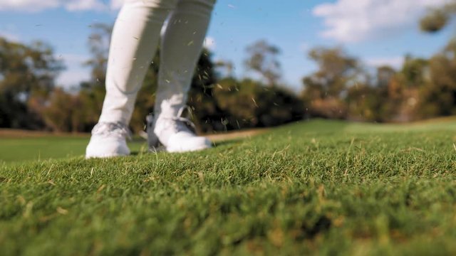 Slow Motion Golf Swing green grass