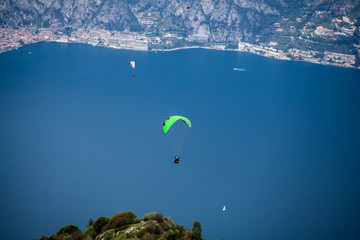 Paraglider over lake Garda