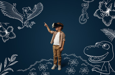 Painted dream about Jurassic period with dinosaurs in the jungle. Little boy with virtual reality...