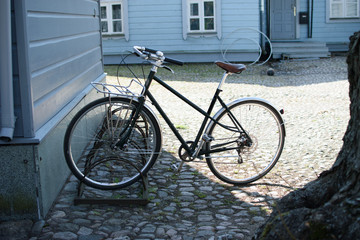 Fototapeta na wymiar City bike on the background of the house.