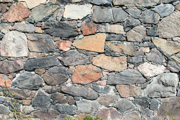 Wall of large natural stones.
