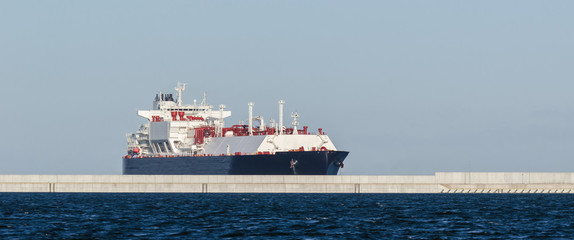 GAS CARRIER - A tanker with a natural gas cargo flows to the sea port