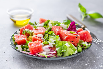 Summer salad with watermelon and salad leaves