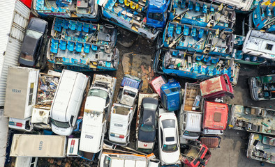 Old motor vehicles piled up waiting to be dismantled and eliminated