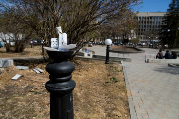 Broken white street lamp . public order disturbance