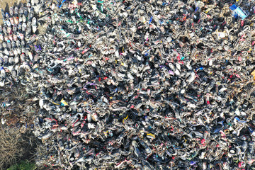 Old motor vehicles piled up waiting to be dismantled and eliminated