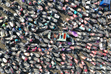 Old motor vehicles piled up waiting to be dismantled and eliminated