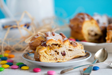 Easter cake with nuts and dry fruits on white wooden background
