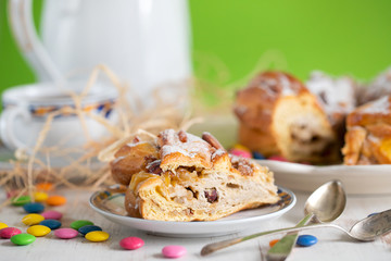 Easter cake with nuts and dry fruits on white wooden background