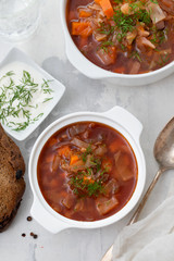 traditional russuan soup borsch in white bowl