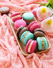 Colorful macaroons and tulips