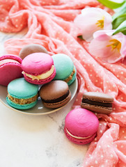 Colorful macaroons and tulips