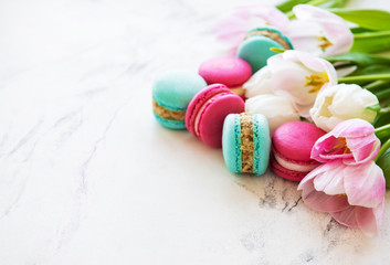 Colorful macaroons and tulips