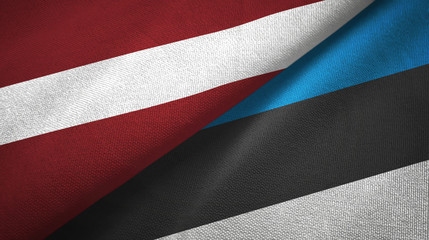 Fototapeta na wymiar Latvia and Estonia two flags textile cloth, fabric texture