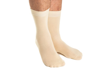 Fototapeta na wymiar male legs in socks isolated