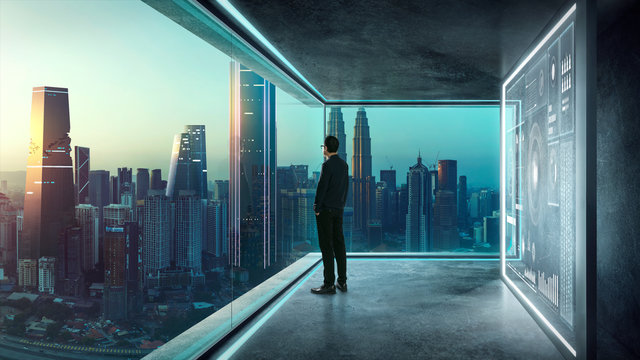 Businessman in suit. with virtual 3d holographic interface screens . Futuristic business, technology, internet and social networking  technology concept .