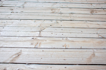 Wooden texture. A background from the old gray boards lying in a row