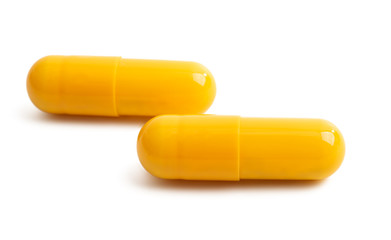 yellow capsules isolated