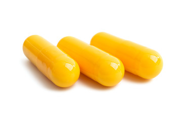 yellow capsules isolated