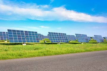 Solar station. Solar panels for the production of natural solar energy along the road. Green electricity. Place for text, copy space, web banner, banner, advertisement.
