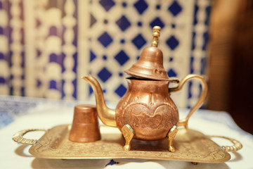 Festive moroccan tea table setting. Oriental hospitality.