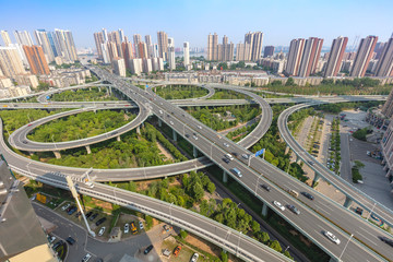 city highway interchange with blue sky, aerial view of modern traffic background.Wuhan, the largest transportation and economic hub city in central China.