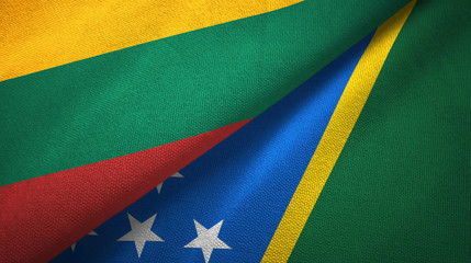 Lithuania and Solomon Islands two flags textile cloth, fabric texture