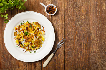 Biryani with chicken. Traditional Indian dish of rice and chicken marinated in spices and yoghurt.