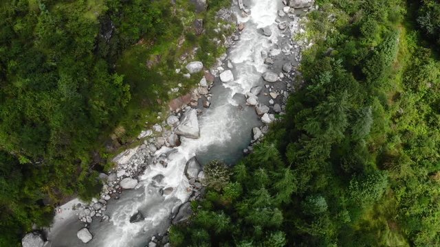 4k aerial birdseye fly over river in the north of India