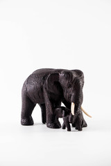 Fototapeta na wymiar Elephant family carved from wood