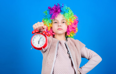 Punctuality is a kingly virtue. Cute little child demanding punctuality. Adorable small girl strictly observing punctuality. Punctuality concept