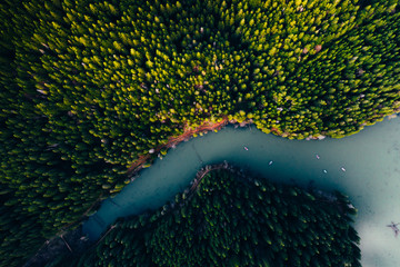 Lake with small boats seen from a drone