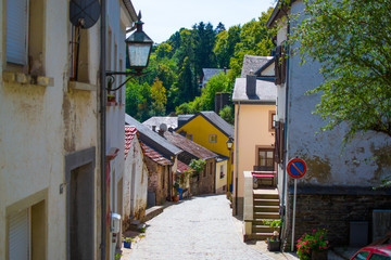 Typical street in the old town of Vianden, in Luxembourg, Europe, with colorful houses