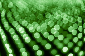Abstract bokeh background. Soft defocused lights. Neon basic green color
