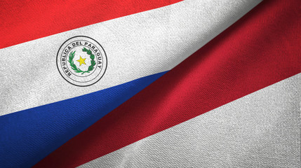 Paraguay and Indonesia two flags textile cloth, fabric texture