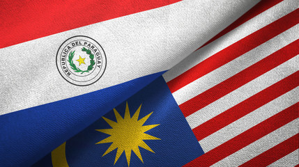 Paraguay and Malaysia two flags textile cloth, fabric texture