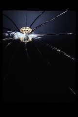 diamond on broken glass black background