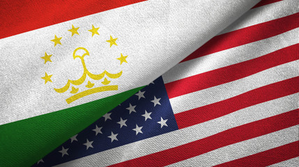 Fototapeta premium Tajikistan and United States two flags textile cloth, fabric texture