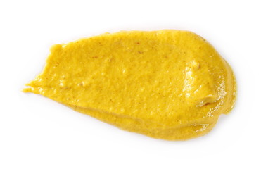 Yellow mustard sauce, spread isolated on white background, top view