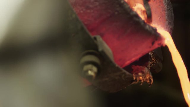 hot bronze being poured