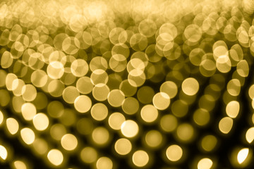 Abstract bokeh background. Soft defocused lights. Neon basic yellow color
