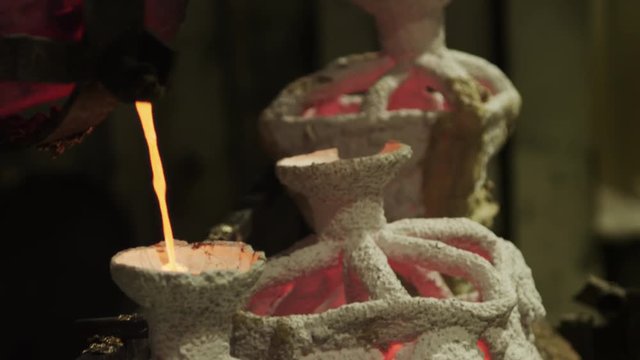 hot bronze being poured
